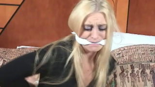 Platinum blonde girl Keli Anderson getting tied up on the hotel room